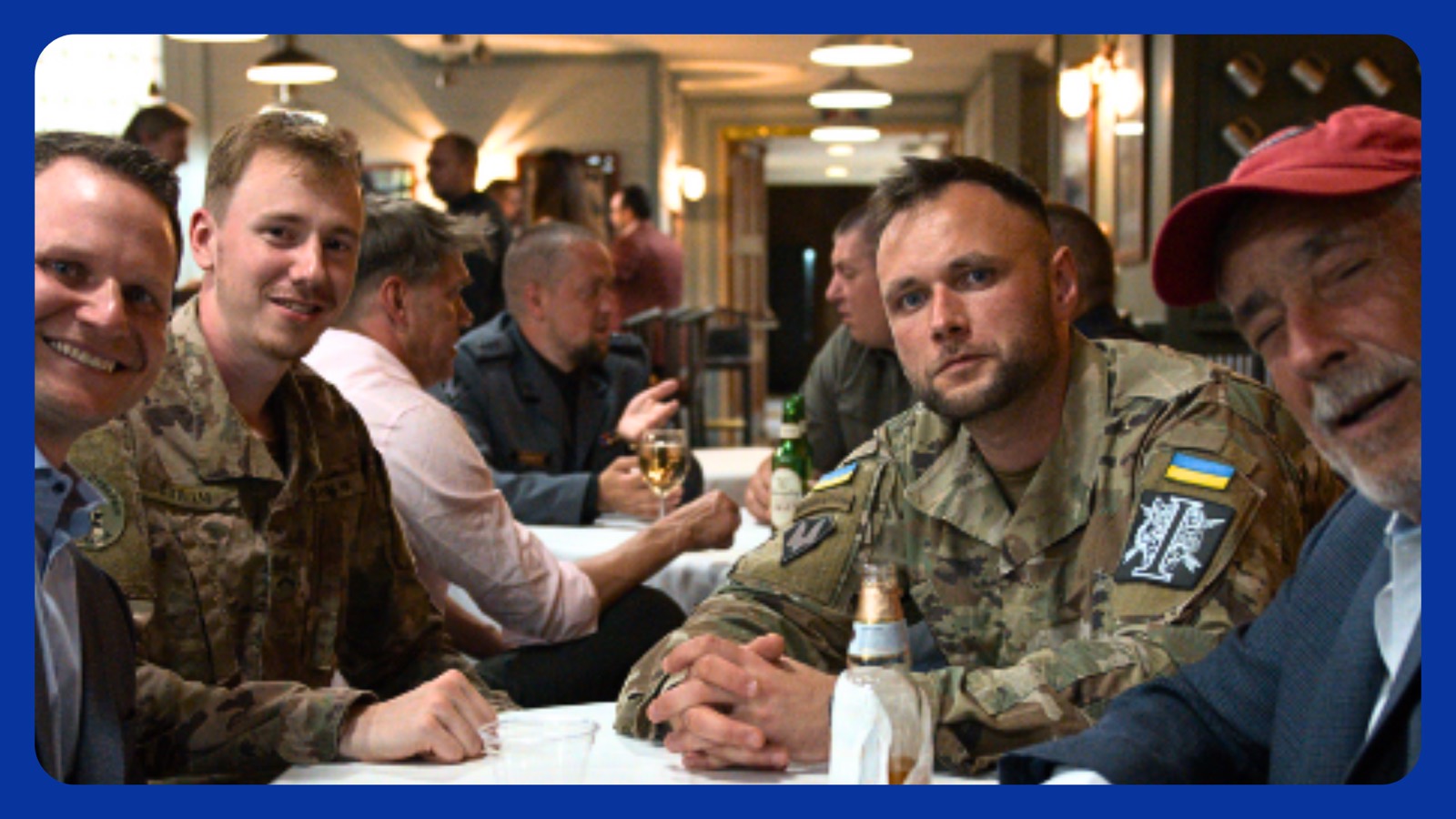 Veterans and supporters gathered around a table